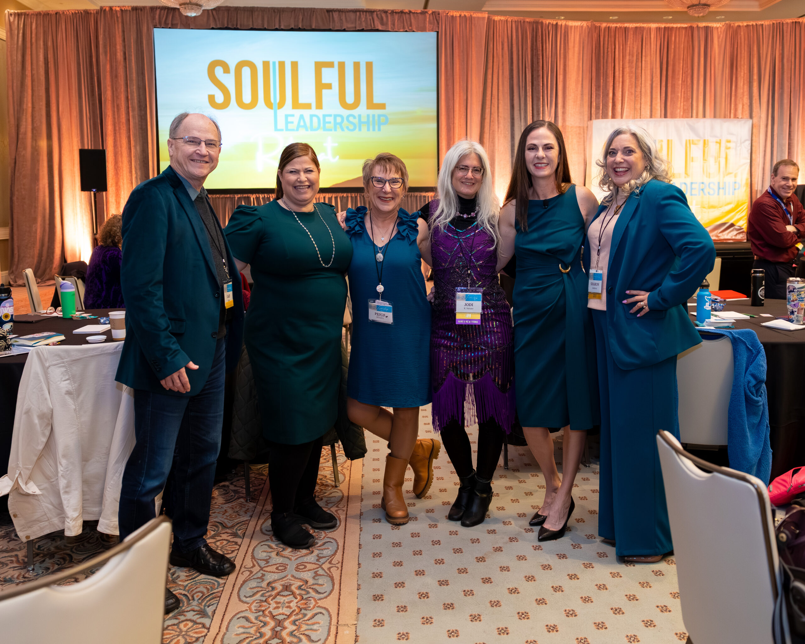 Soulful Leadership attendees in front of the event stage
